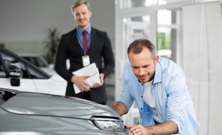 Buyer consulting with professional car advisor
