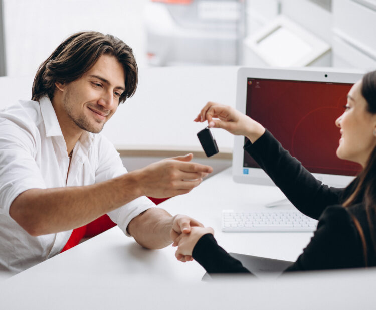 Buyer reviewing car financing options during F&I review