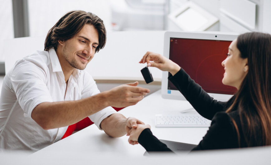 Buyer reviewing car financing options during F&I review